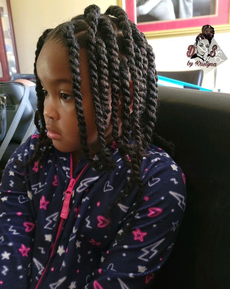 Kids simple twist — chunky two-strand twists on a young child, side view