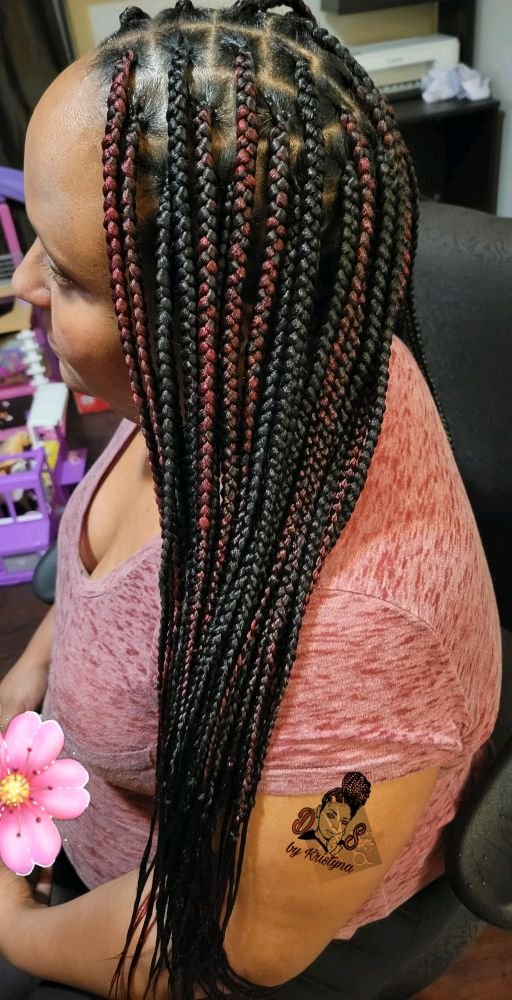 Knotless braids in black with burgundy highlights, long and sleek, side view